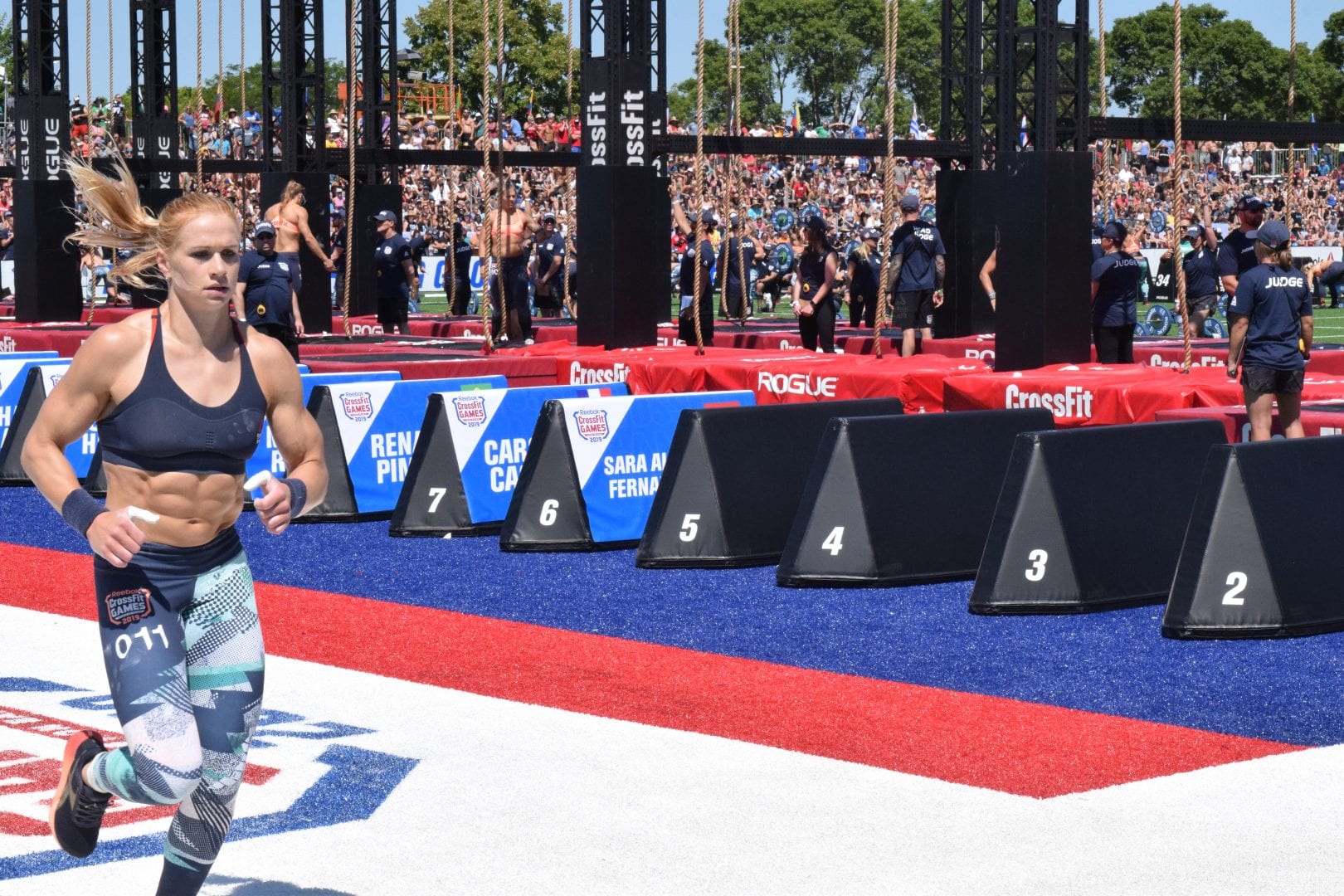 Annie Thorisdottir completes a run before starting her legless rope climbs at the CrossFit Games.