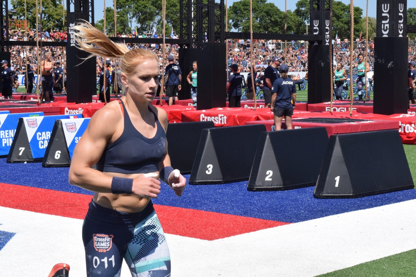 Annie Thorisdottir completes a run before starting her legless rope climbs at the CrossFit Games.
