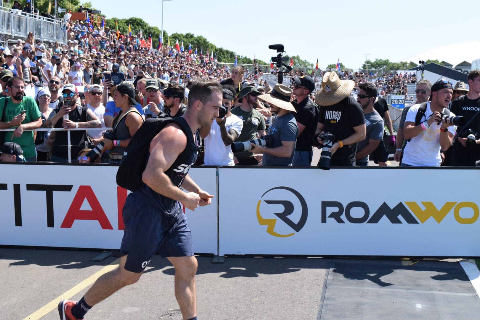 Ben Smith of the United States completes the Ruck Run event at the 2019 CrossFit Games
