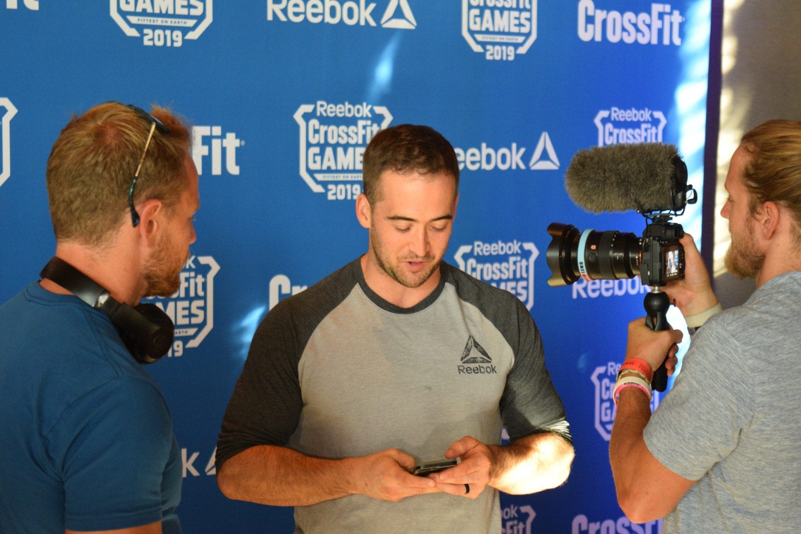 Ben Smith chats with the Buttery Bros at the pre-CrossFit Games athlete dinner