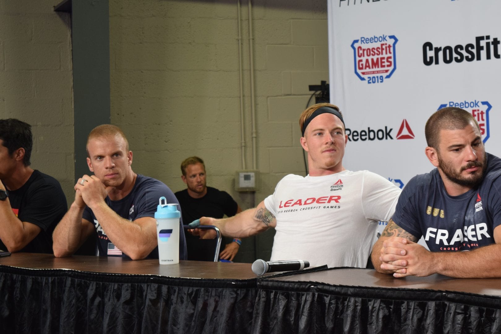 Scott Panchik at an end-of-day press conference with Dave Castro and Noah Ohlsen during the 2019 CrossFit Games
