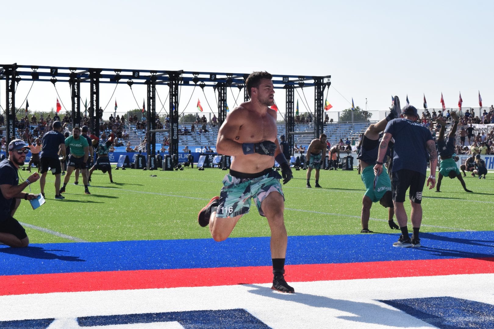 Alex Vigneault crosses the finish line in the second event of the 2019 CrossFit Games