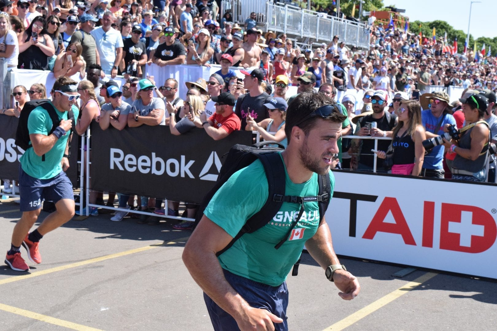 Alex Vigneault of Canada completes the Ruck Run event at the 2019 CrossFit Games