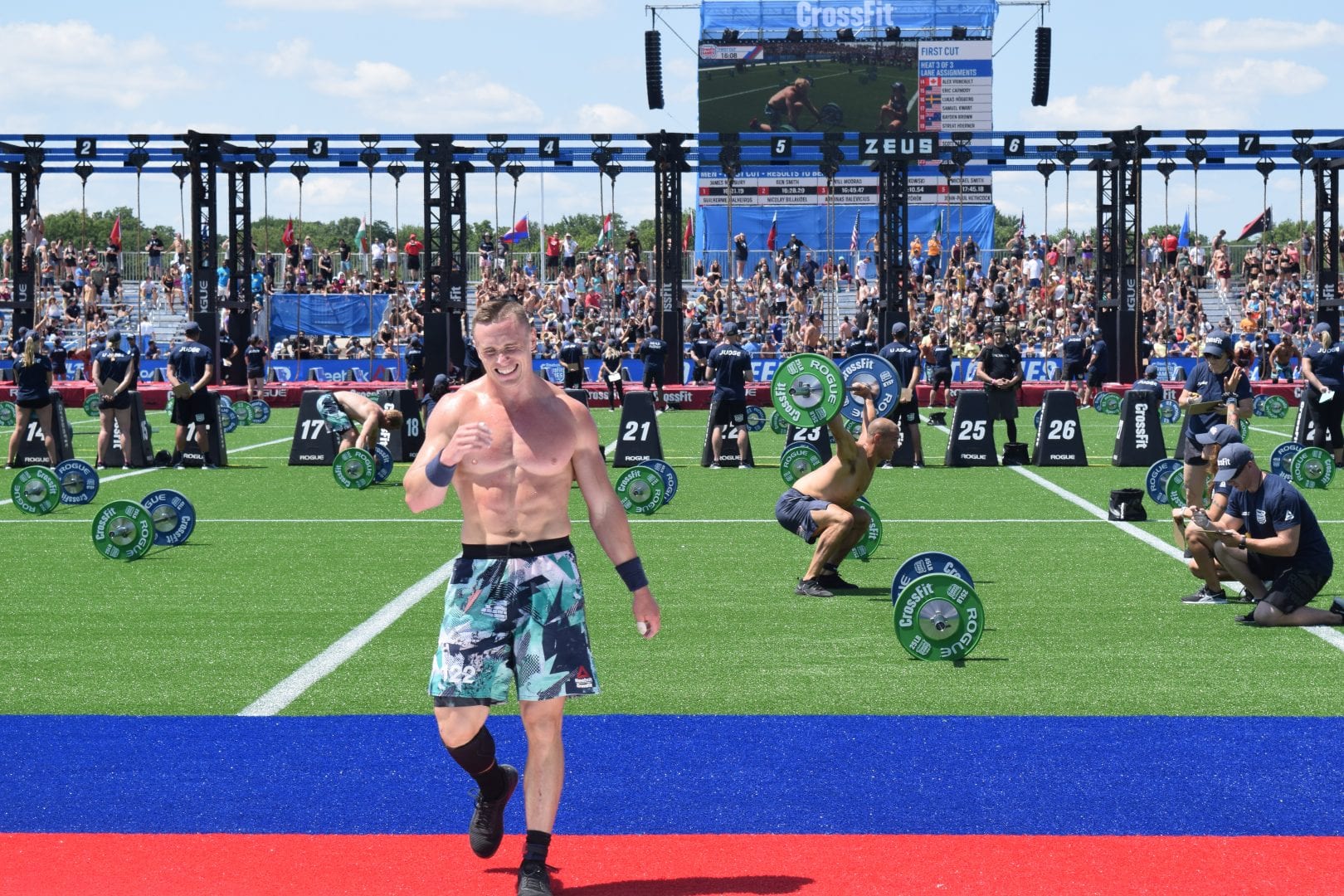 Bjorgvin Karl Gudmundsson crosses the finish line of the first event at the 2019 CrossFit Games