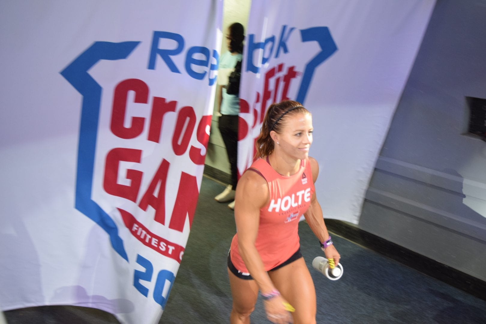Kristin Holte enters the floor of the coliseum on the final day of the 2019 CrossFit Games.