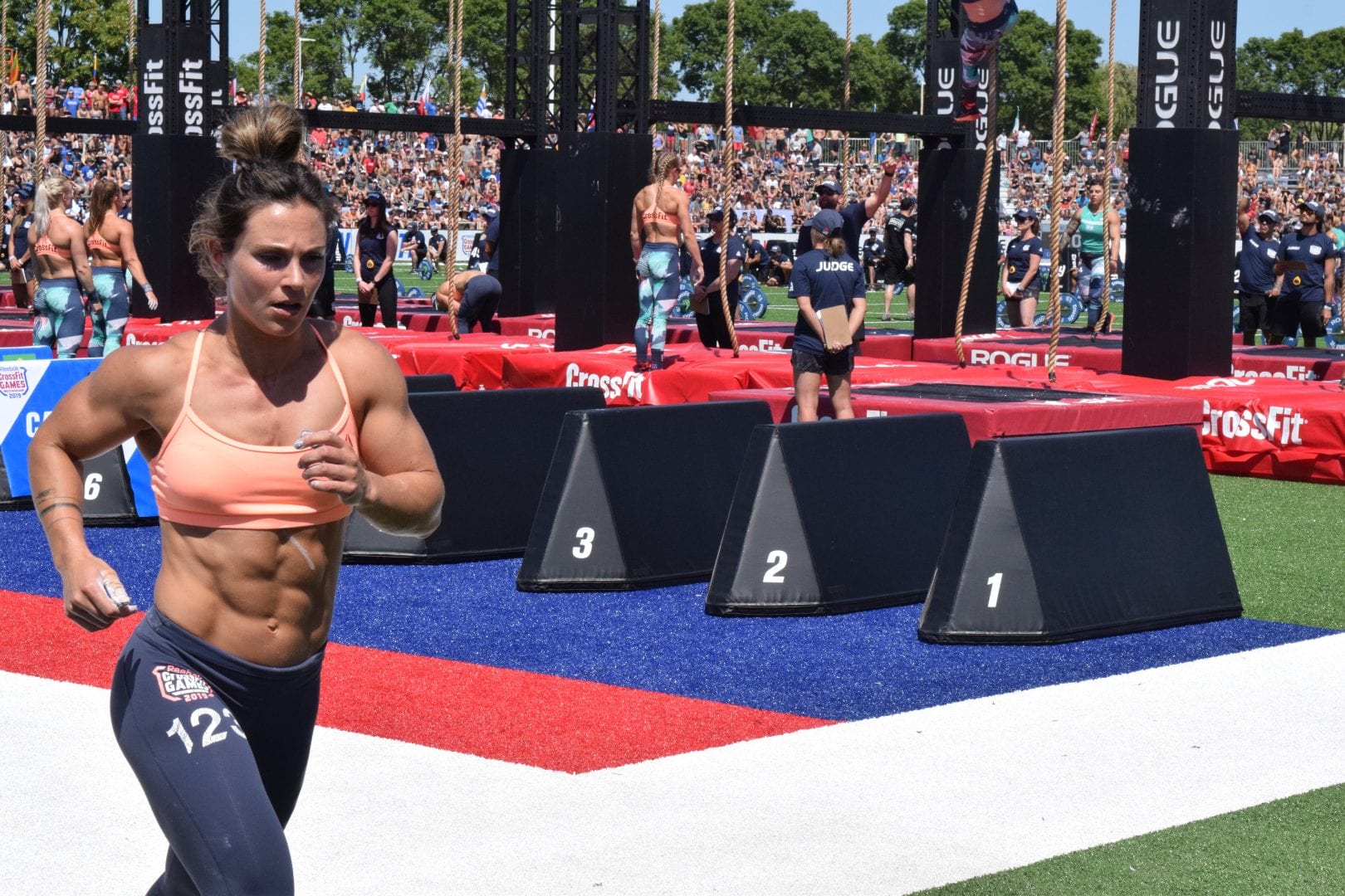 Jamie Greene takes a lap between rounds of legless rope climbs at the 2019 CrossFit Games