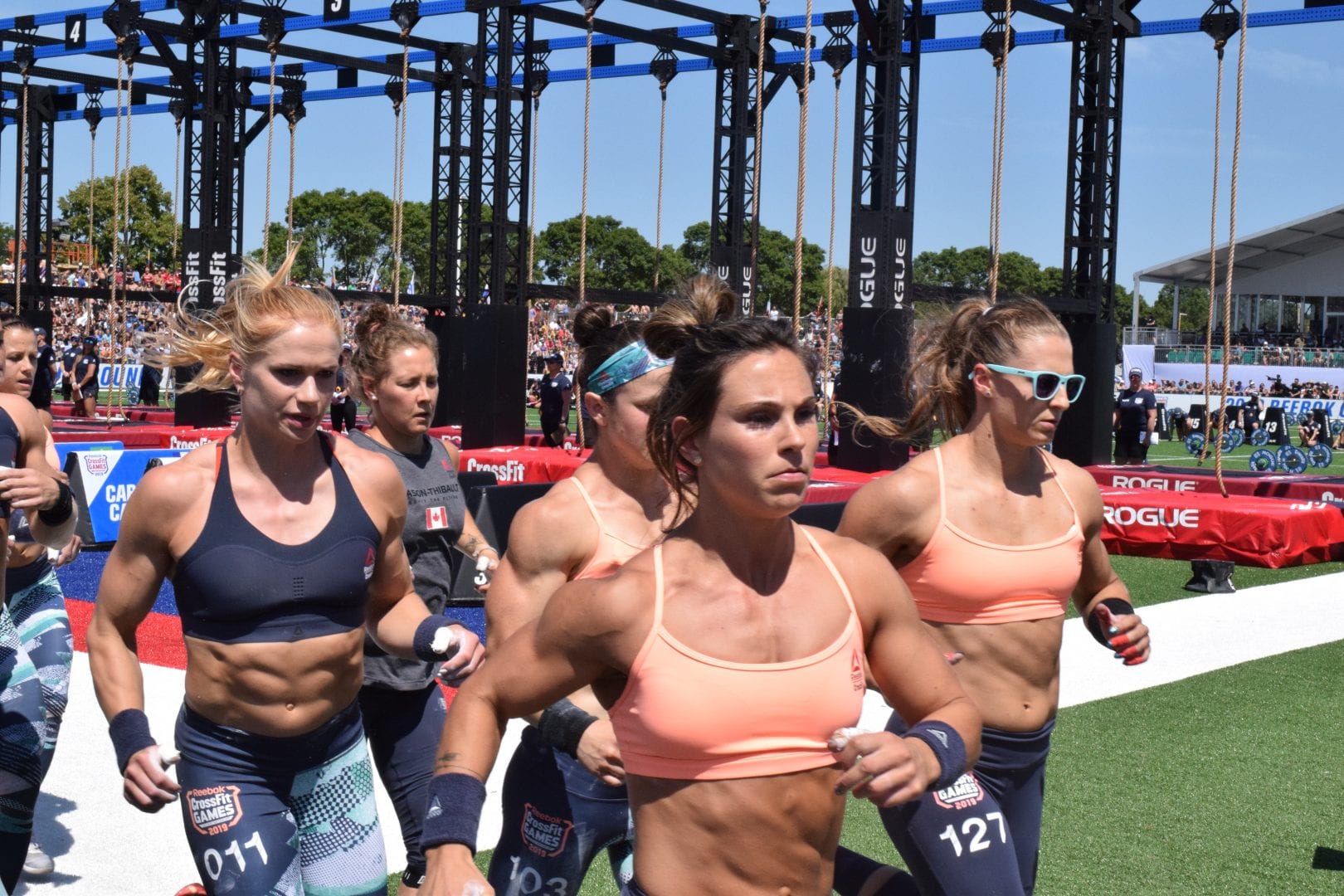 Karin Freyova and the pack take their first lap before completing legless rope climbs at the 2019 CrossFit Games
