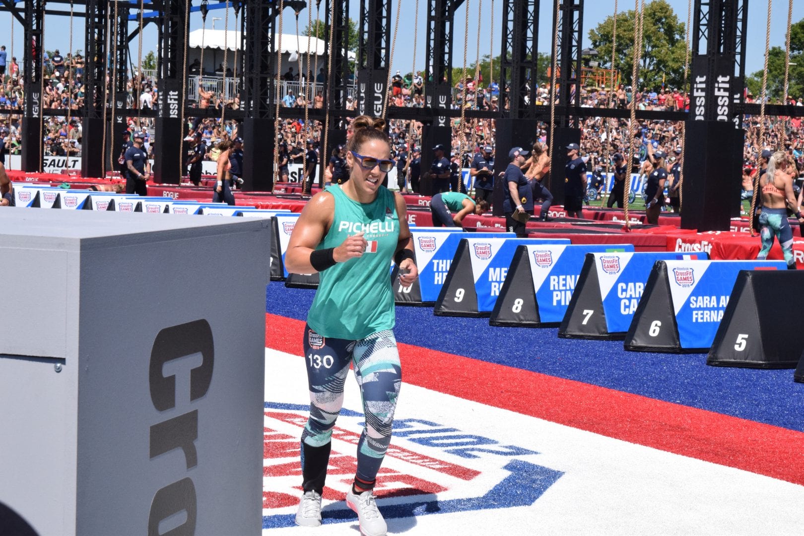 Alessandra Pichelli takes a lap between rounds of legless rope climbs at the 2019 CrossFit Games