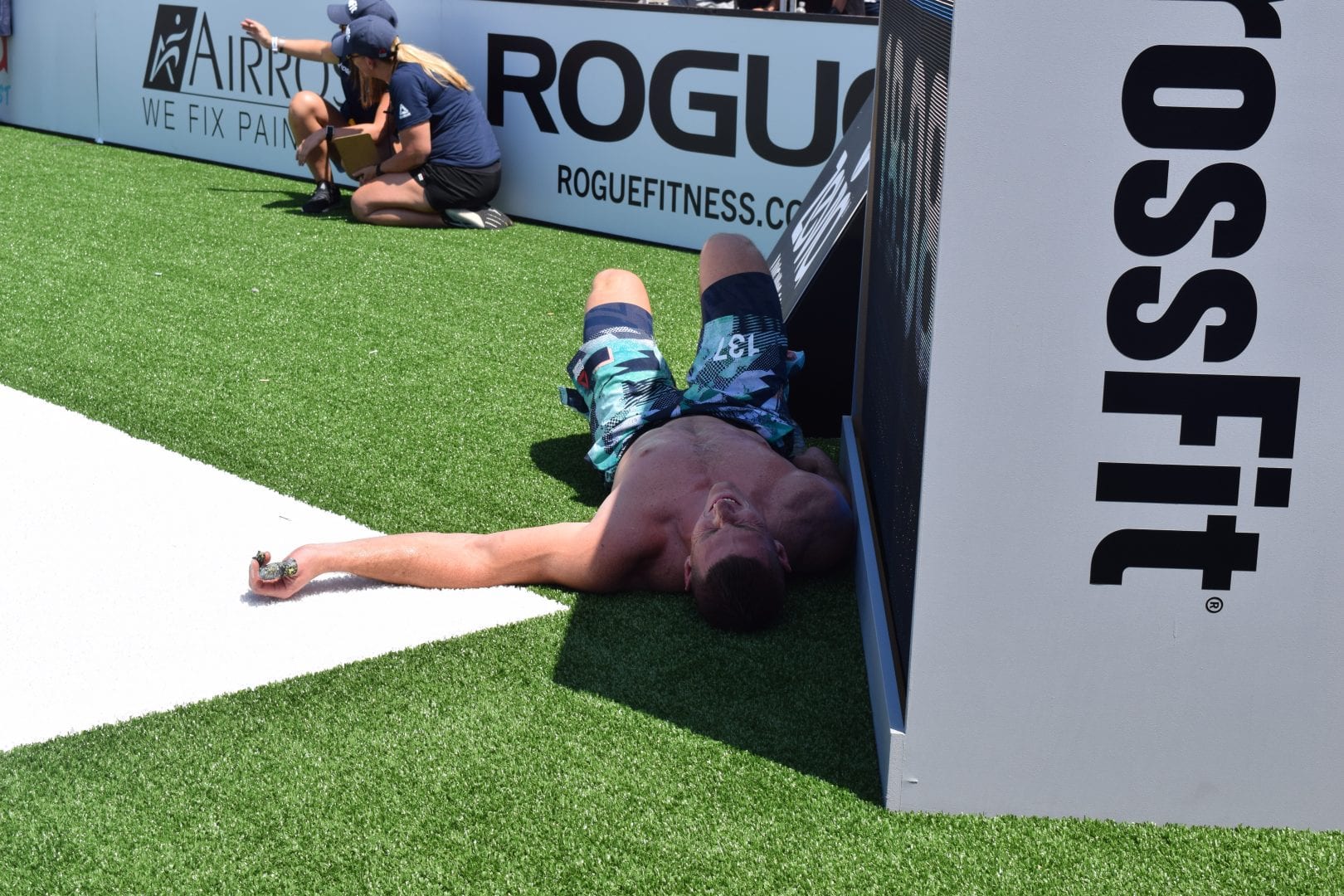 Jason Smith seeks shade after an event at the 2019 CrossFit Games