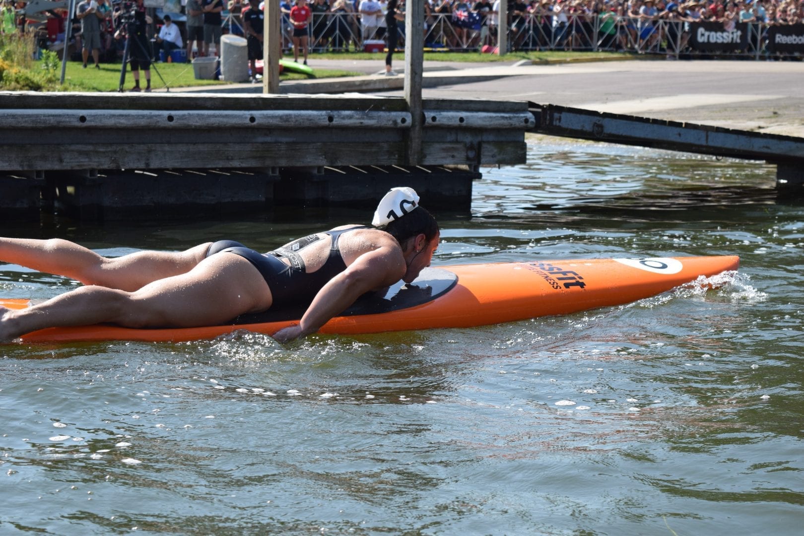 Bethany Shadburne of Streamline CrossFit completes the Swim Paddle event at the 2019 CrossFit Games