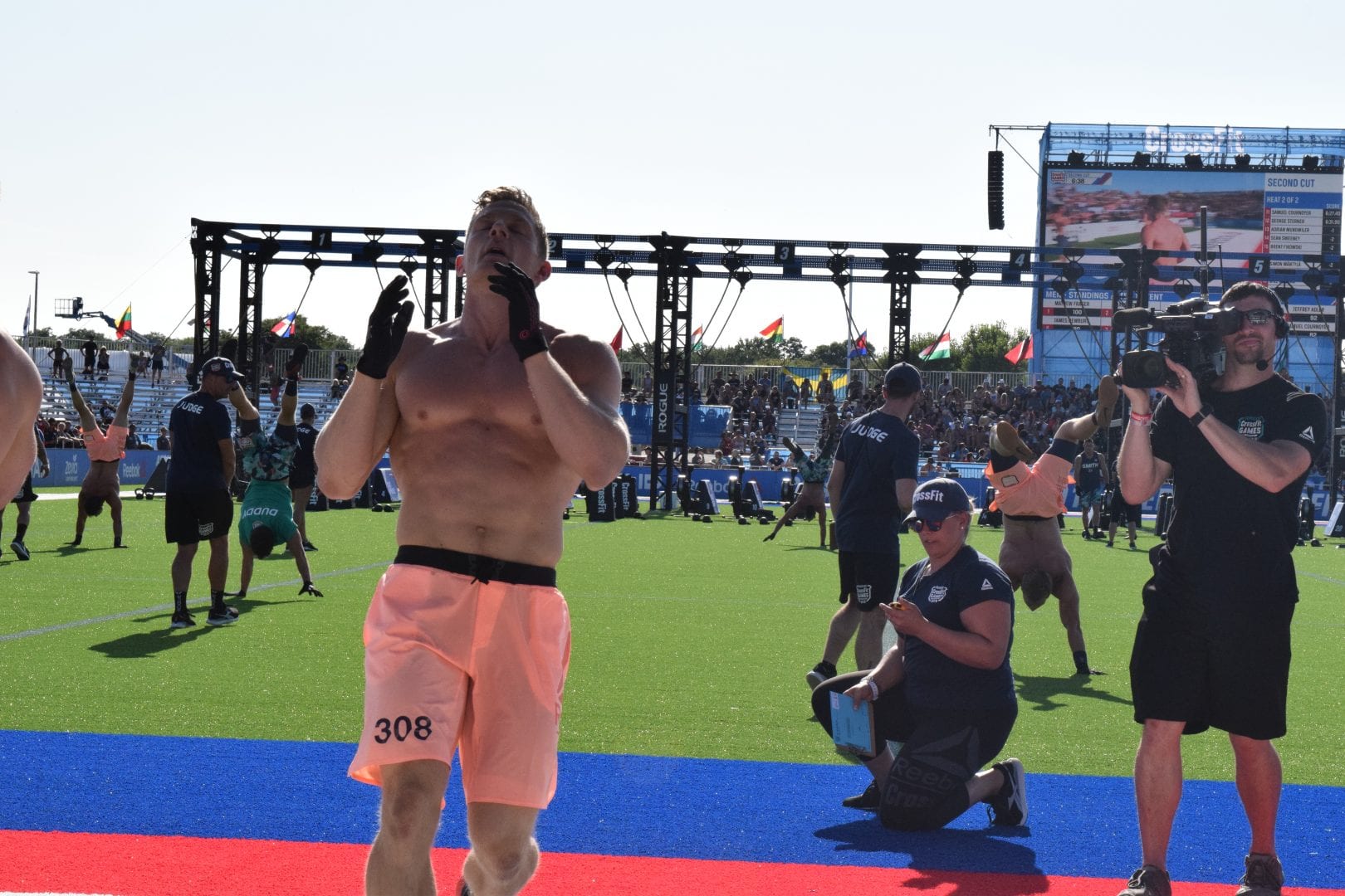 Brent Fikowski crosses the finish line of the second event at the 2019 CrossFit Games