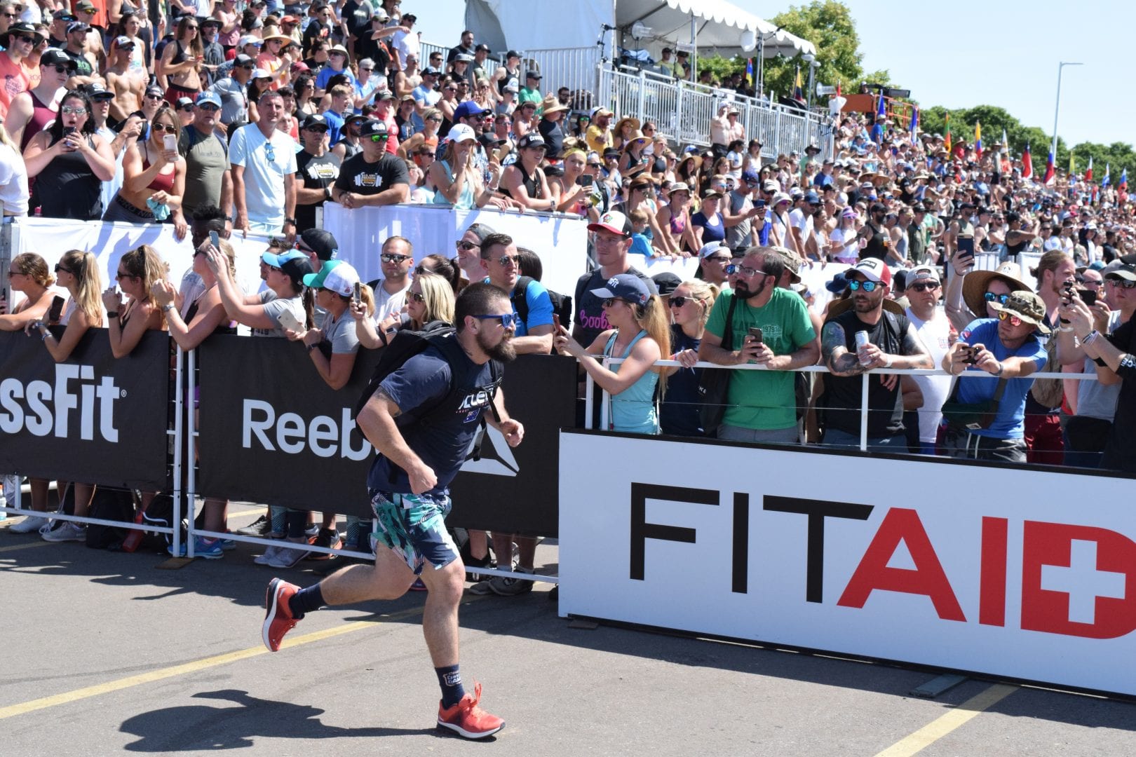 Matt Mcleod of Australia completes the Ruck Run event at the 2019 CrossFit Games