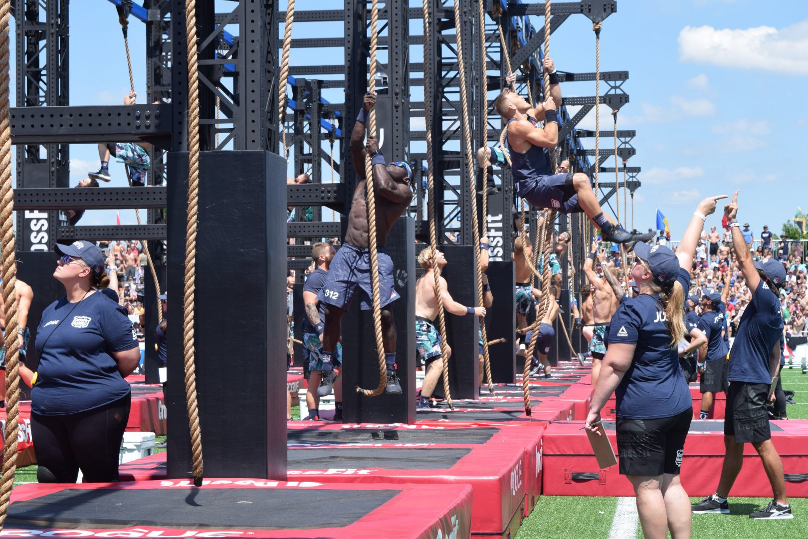 Chandler Smith completes a legless rope climb at the 2019 CrossFit Games