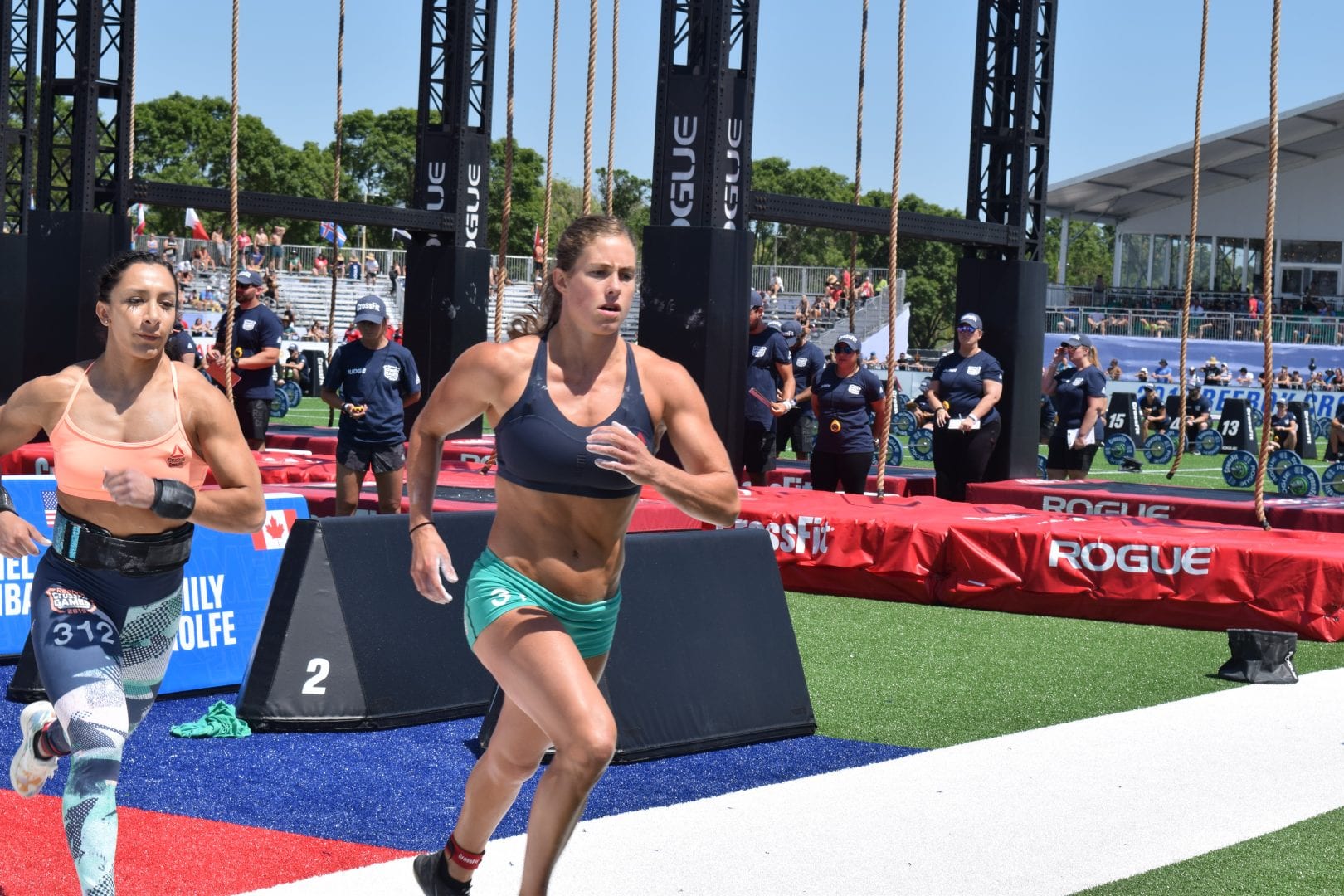 Rachel Garibay takes a lap between rounds of legless rope climbs at the 2019 CrossFit Games