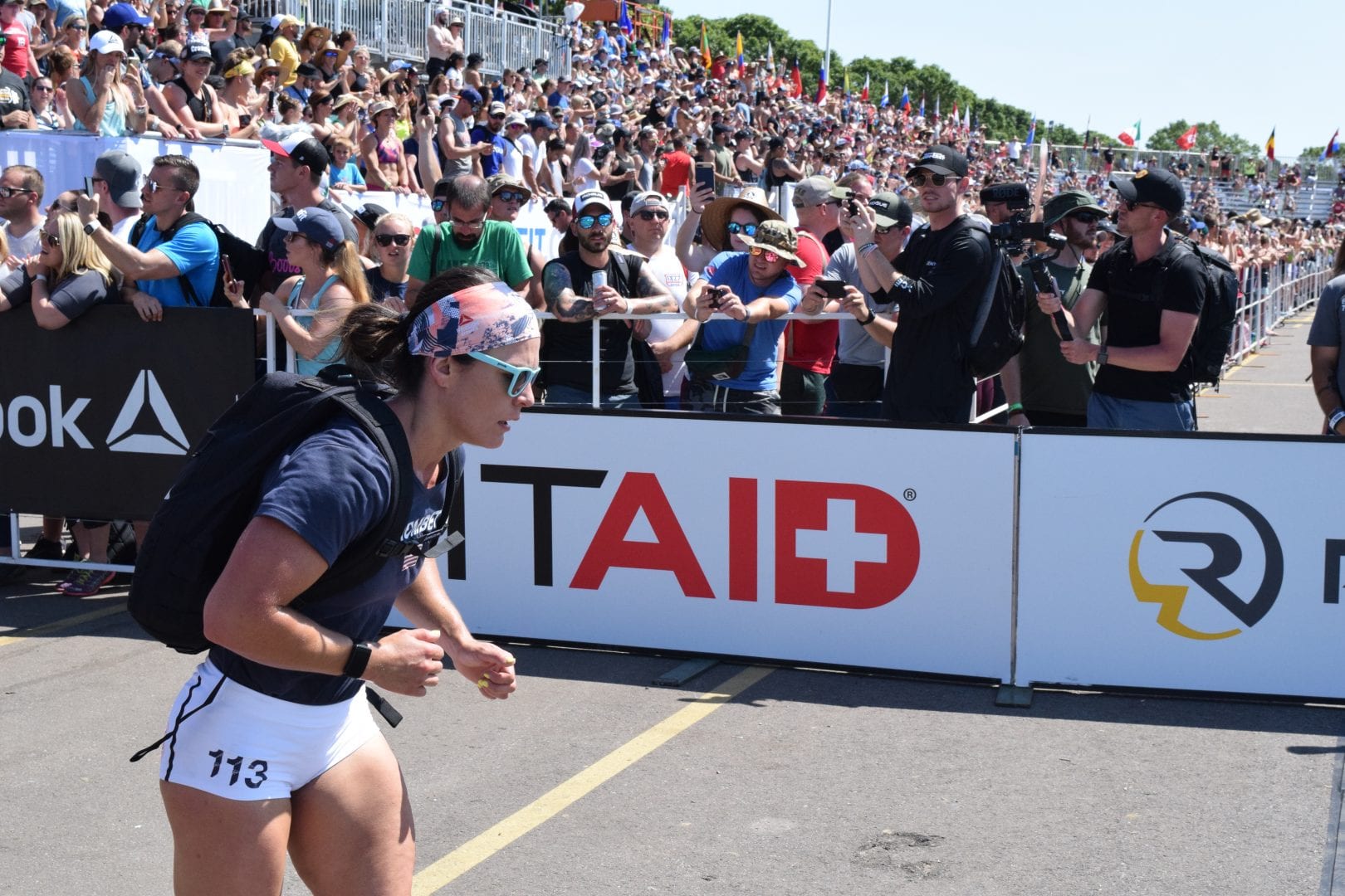 Katie Trombetta competes in the Ruck Run event at the 2019 CrossFit Games
